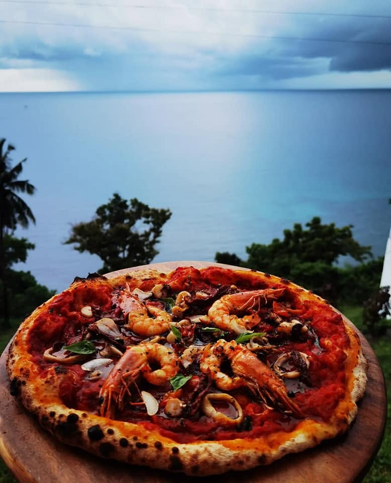 Wood-fired pizza at Villa Negro Cafe